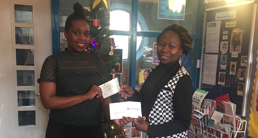 Co-ordinator of Camberwell After School Project receiving cheque.
