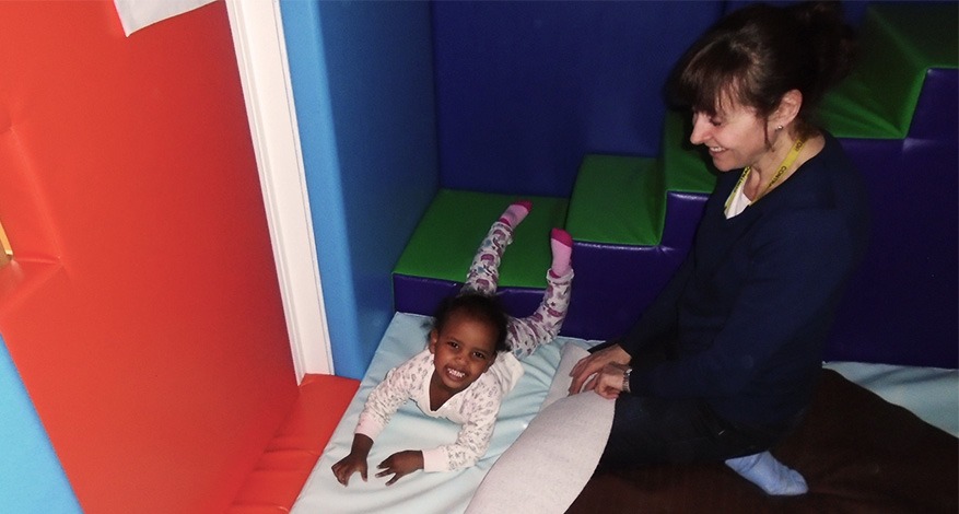 A child plays in the sensory soft room at Tower Hamlets Opportunity Group.