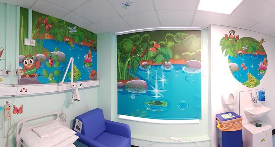 Momentum Children's Charity hospital room decorated with wildlife theme.