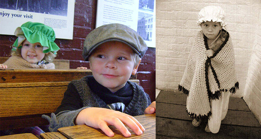 Children play dress up in Victorian clothes at the Ragged School in London.