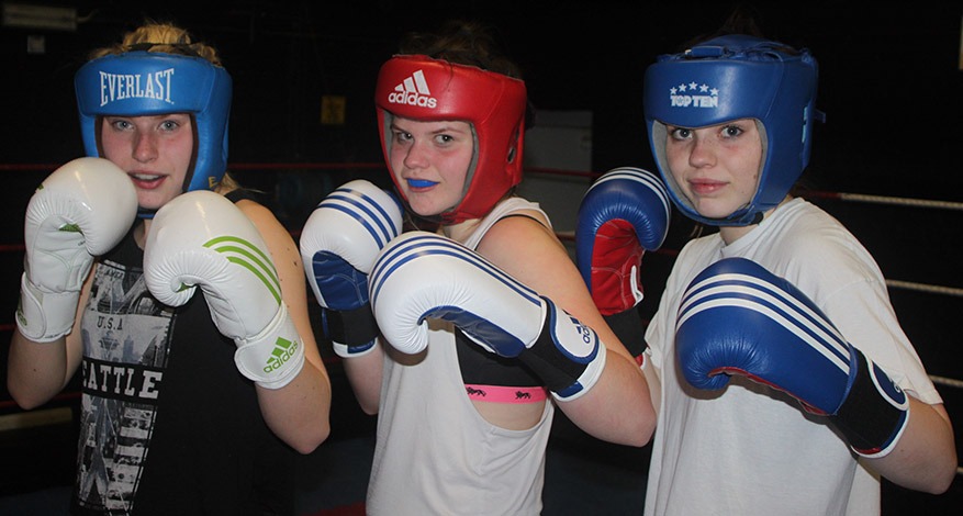 3 girls from Amateur Boxing Club, Swale Gloves pose in fight stance