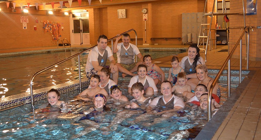 Children enjoy physiotherapy swimming lesson at Waterwings swimming club.