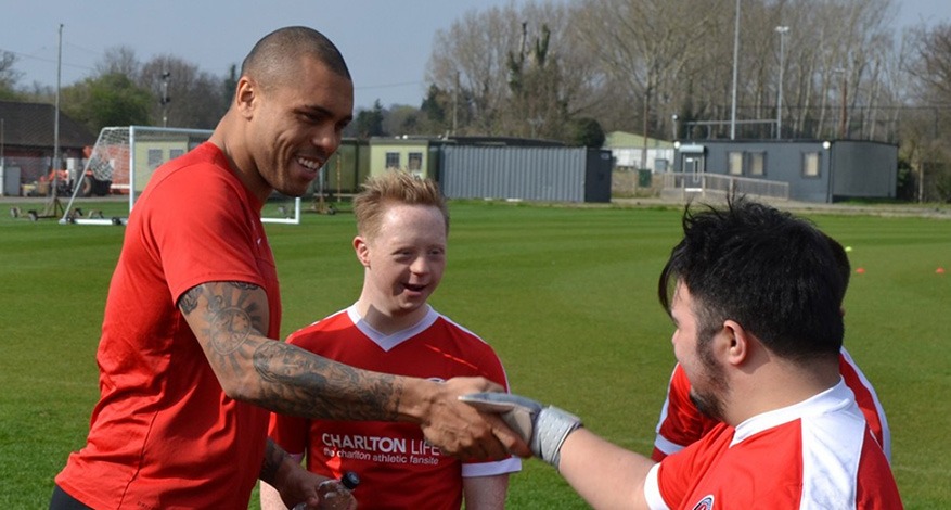 Footballer greets charlton upbeats players from charlton athletic community trust