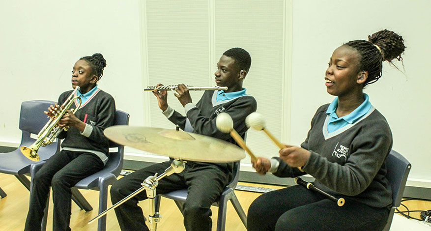 Children playing instruments at London Philharmonic Orchestra.