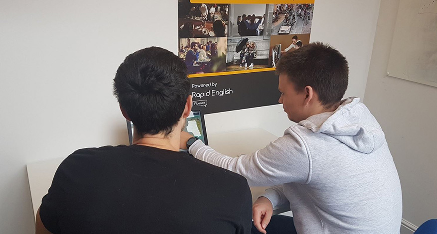 Young Man at the Fluence Foundation being helped with his communication skills