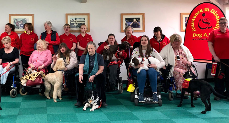 Group of Dog A.I.D service users and volunteers