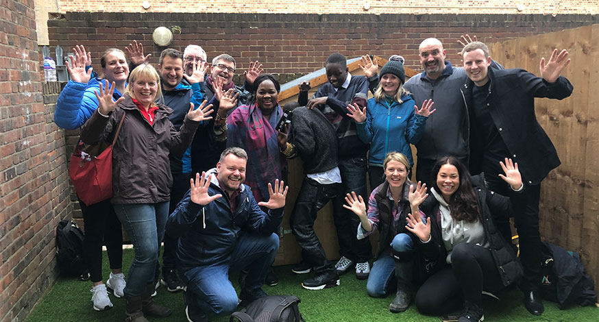 Group pictures of volunteers at one of WellChild's Helping Hands projects