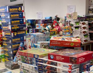 Warehouse full of Christmas gifts for children living in poverty