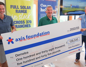 Three people holding cheque from Axis Foundation for Demelza
