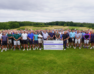 Long line of golf players and big cheque at centre