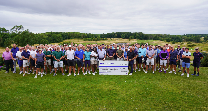 Long line of golf players and big cheque at centre
