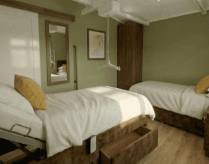 Bedroom with adapted lifting beds and hoist